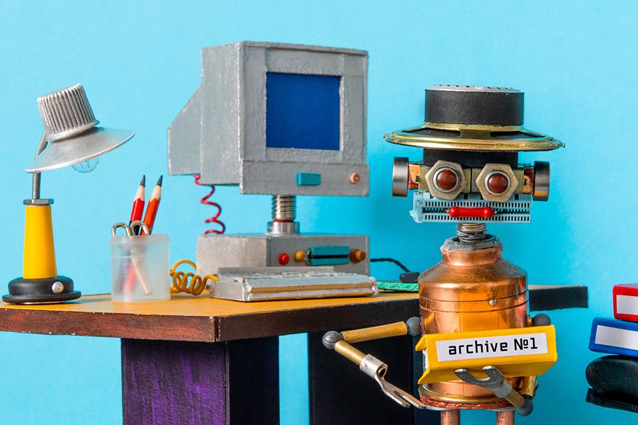 Your Ai Website Looks Great. So Why Isn'T It Working? A Robot Stands In Front Of A Computer.
