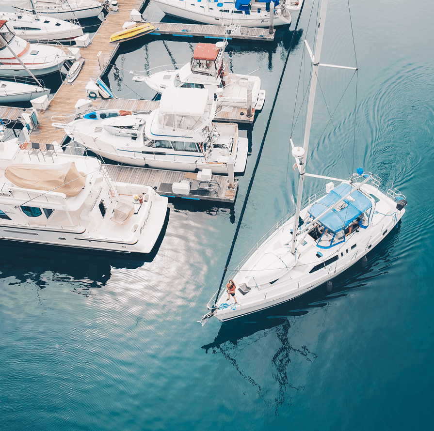 A Well-Lit Boat Pulling Away From The Dock.