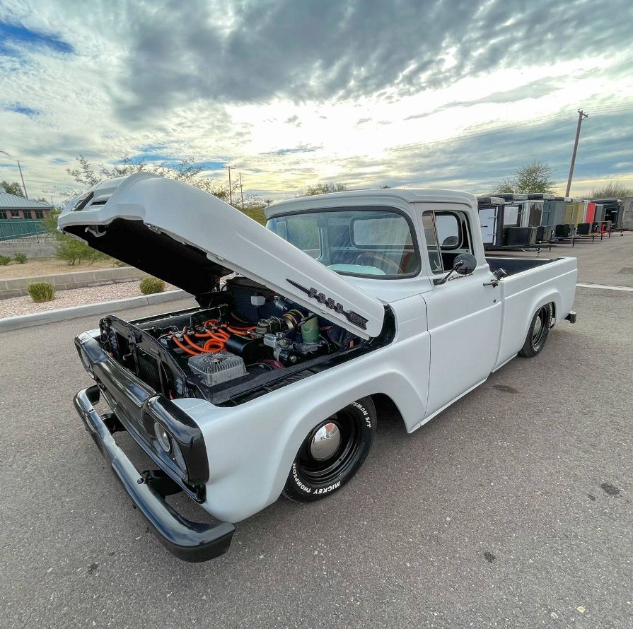 A Classic Truck Showing Off Its Electric Motor.