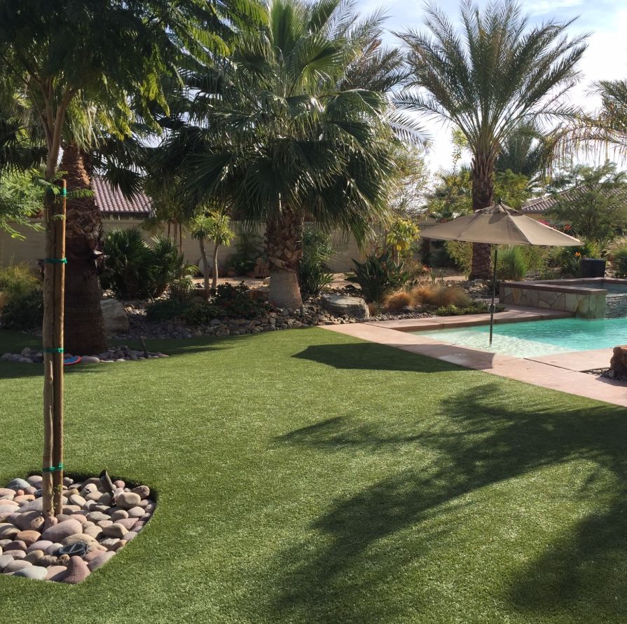 A Backyard Landscaped With High-Quality Synthetic Turf From Foreverlawn.