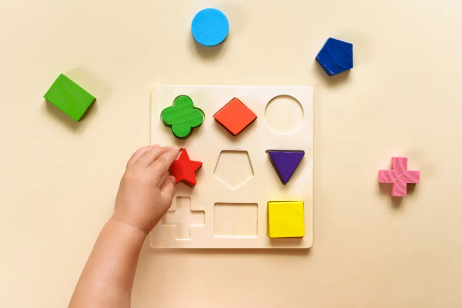 How Ai Chooses Which Websites To Cite &Amp;Amp; How To Become One Of Them A Child Doing A Block Puzzle, Symbolizing How Things Fit Together And Learning
