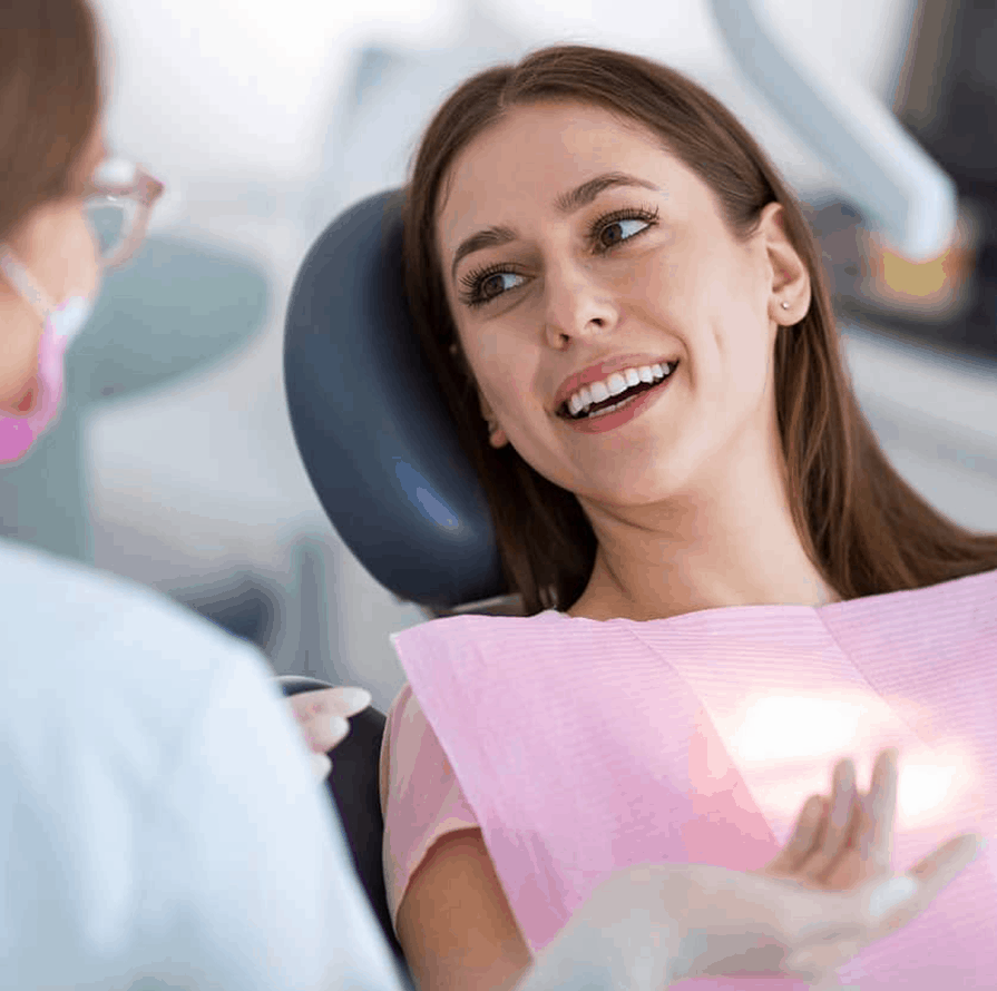 Smiling Woman In A Dentist Chair